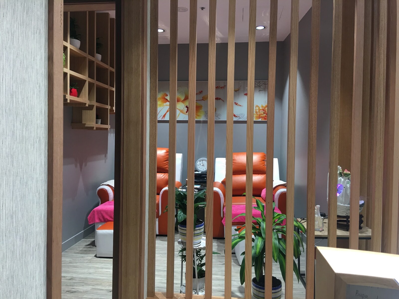 Recliner chairs and a timber screen inside Gold Haven Massage